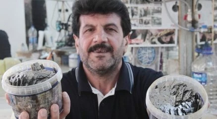 Berberin ilginç jilet koleksiyonu