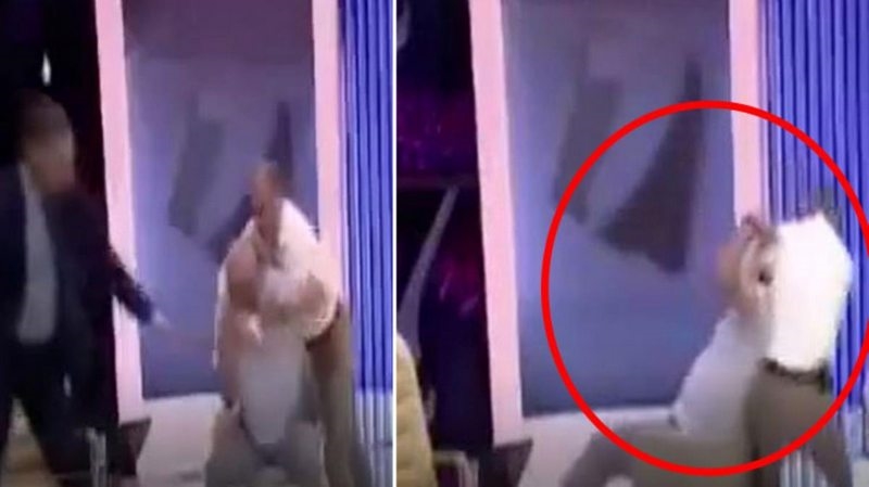 Canlı yayın ringe döndü! Eski bakan yardımcısını önce yumruklayıp sonra koltuğuyla yere yapıştırdı