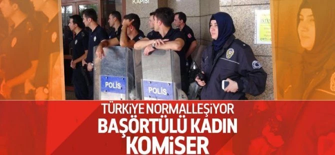 Komiser Yardımcısı başörtüsü ile görevi başında